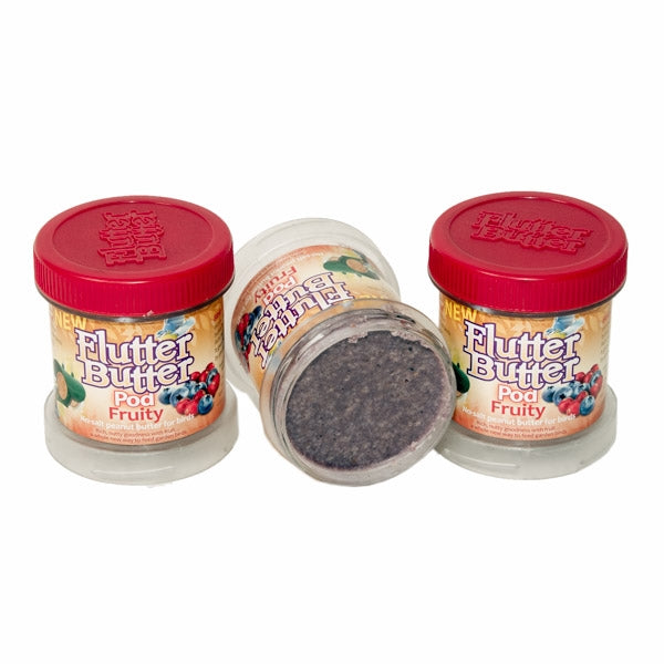 Flutter Butter Pods Fruity; Peanut Butter for birds; Flutter Peanut Butter for birds in a feeder; Birds love peanut butter when its salt free