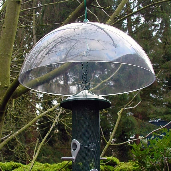 Clear Universal Squirrel Baffle; Clear squirrel baffle supplied with multiple fixings; Clear squirrel baffle pole mounting; Clear Squirrel Baffle in situation