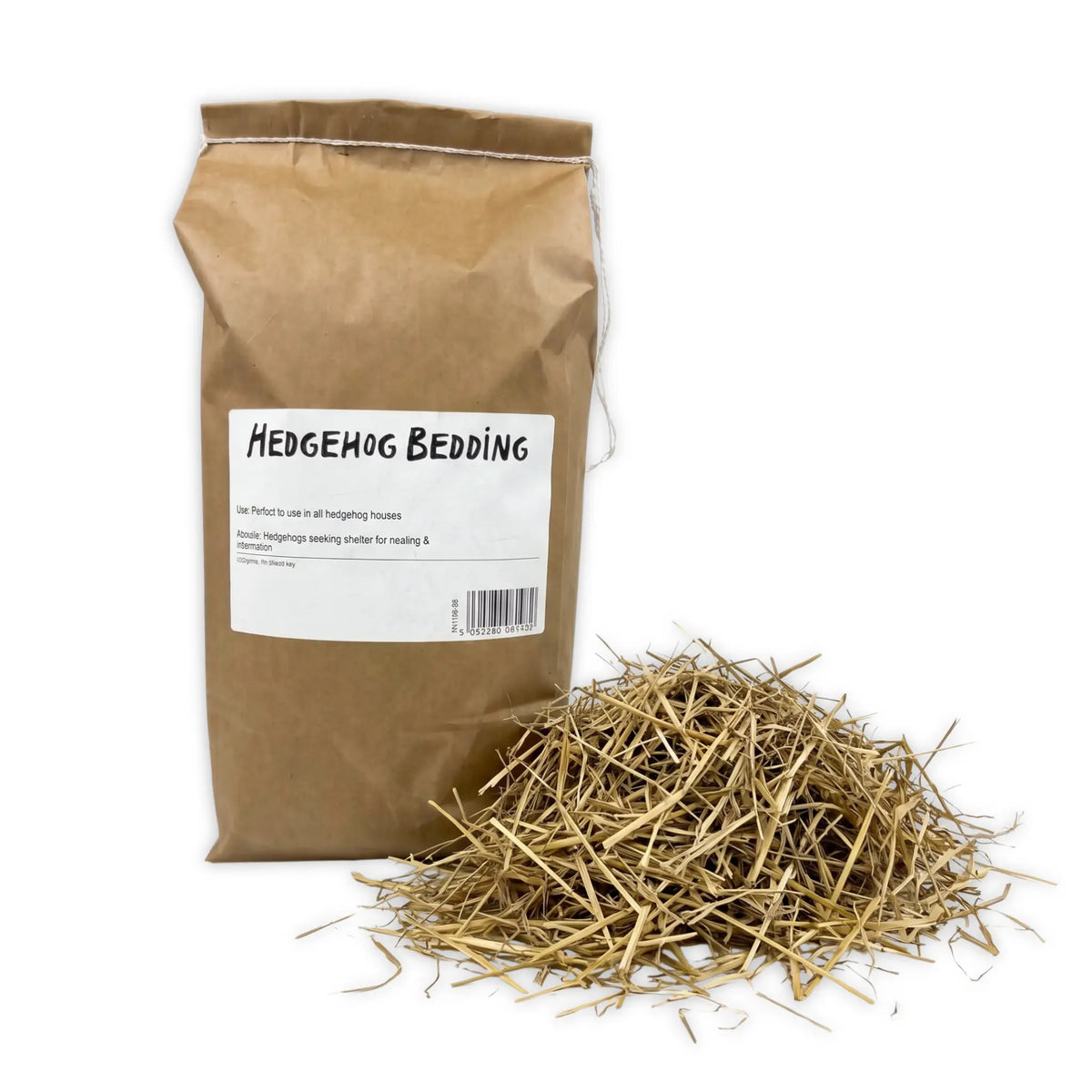 A brown paper bag labeled 'HEDGEHOG BEDDING' stands next to a pile of loose dried hedgehog bedding on a white background.