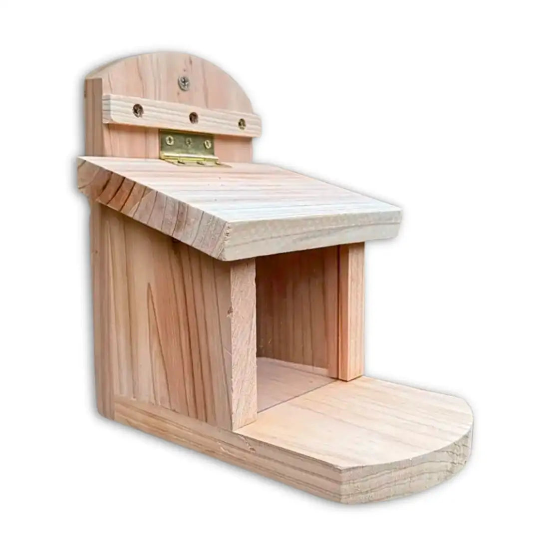 Wooden squirrel feeder on a white background
