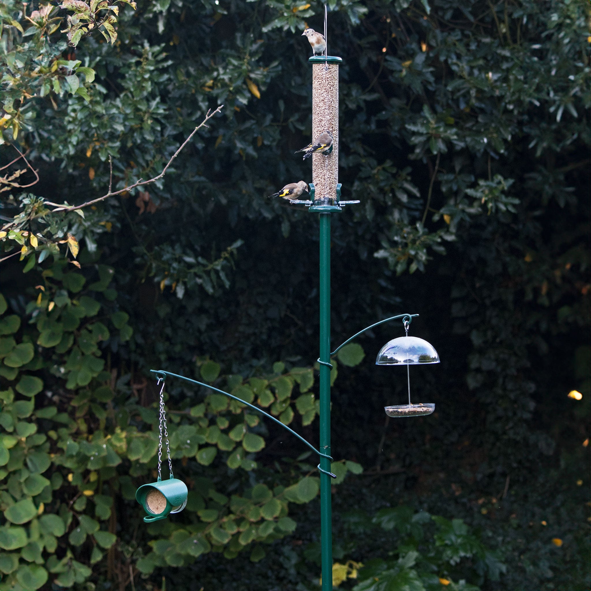 Wraparound hooks on a garden pole system